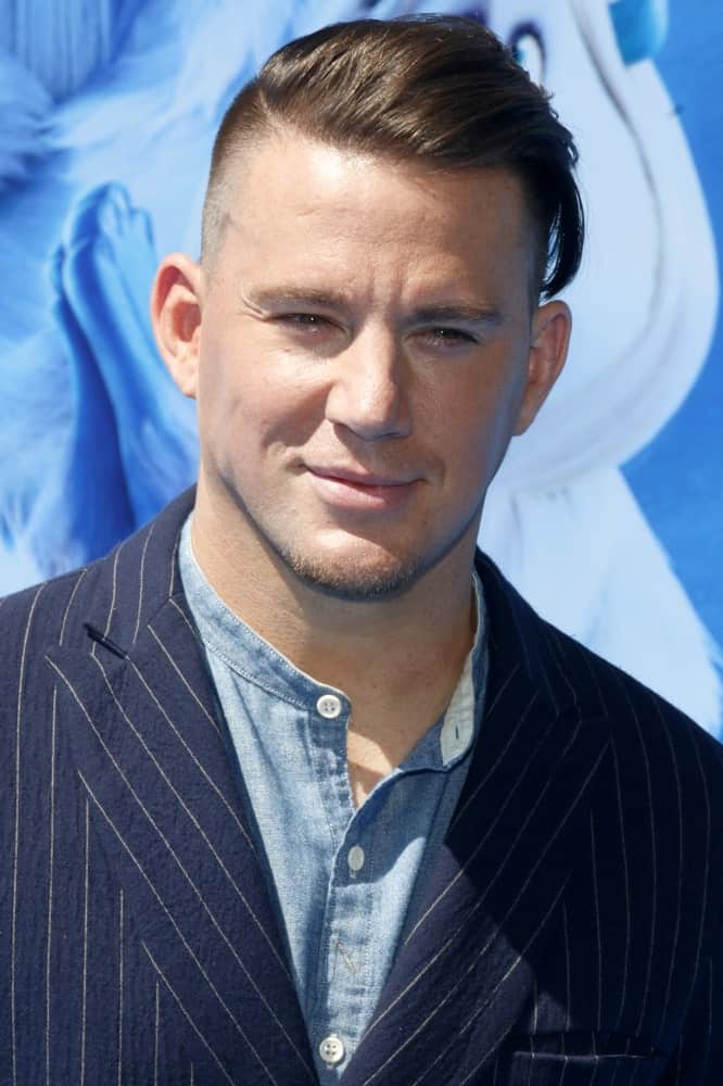 Channing Tatum made an appearance at the Los Angeles premiere of 'Smallfoot' held on September 22, 2018 in a striped suit and a long comb over hairstyle plus a low fade.