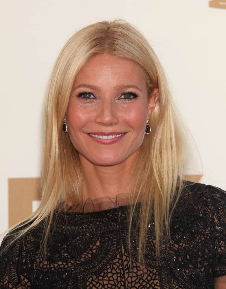 Gwyneth Paltrow rocked a slightly messy hairstyle paired with a black lace dress at the Emmy Awards 2011 held on August 11, 2012 in Los Angeles, CA.
