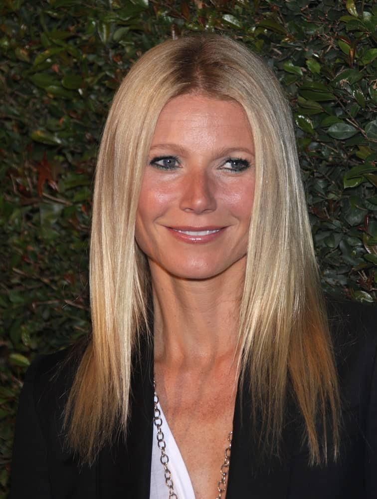 Gwyneth Paltrow looking sleek in her iconic fine blonde hair that's center-parted during the "My Valentine" World Premiere on April 13, 2012 in Beverly Hills, CA.