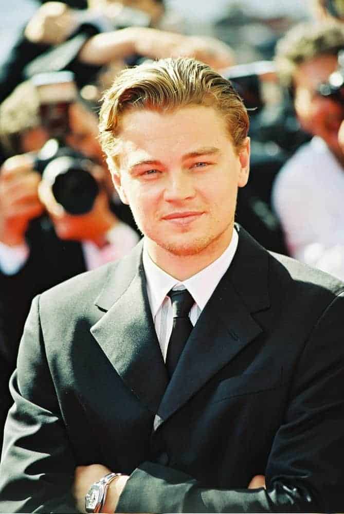 Leonardo DiCaprio showed up with wavy swept-back hair for the photocall of "Gangs of New York" at the 55th Cannes film festival in 2002.