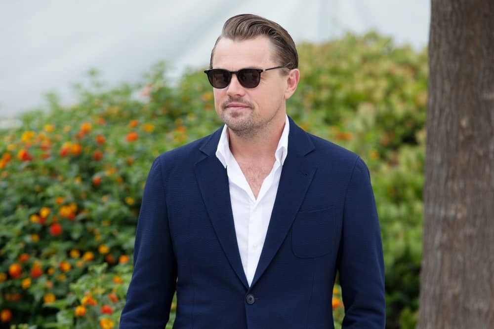 Leonardo DiCaprio arrived for the photo-call of the movie "Once Upon A Time In Hollywood" during the 72nd Cannes Film Festival on May 22, 2019. He wore a sleek side-swept with subtle fade paired with a stubble beard.
