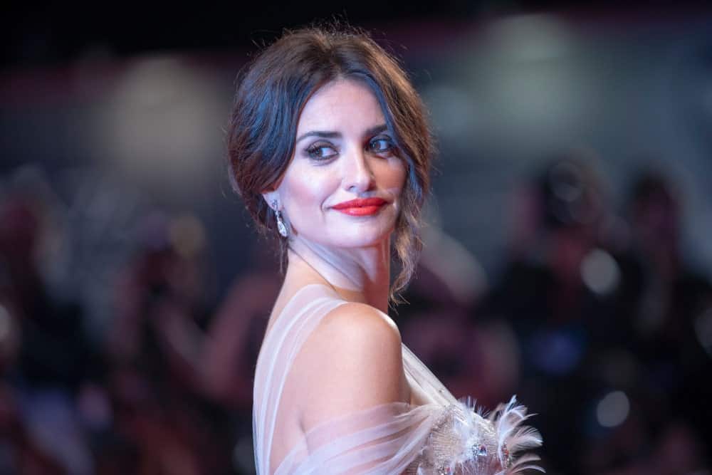 Penelope Cruz stuns the crowd with her glamorous upstyle as she walks the red carpet ahead of the "Wasp Network" screening on September 01, 2019.