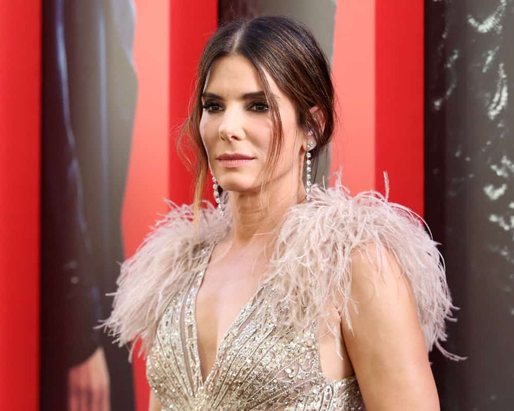 Sandra Bullock attended the premiere of"Ocean's 8" at Alice Tully Hall last June 5, 2018 in New York City. She wore a fashion-forward gown with ruffles on the shoulders to complement her half-up hairstyle with tendrils.