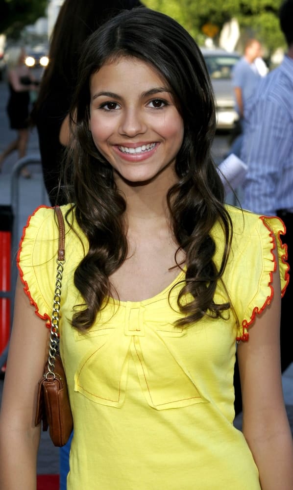 Victoria Justice attended the Los Angeles Premiere of "Click" held at the Mann's Village Theater in Westwood, California on June 14, 2006. She came wearing a casual outfit with her long curly layers loose on her shoulders.