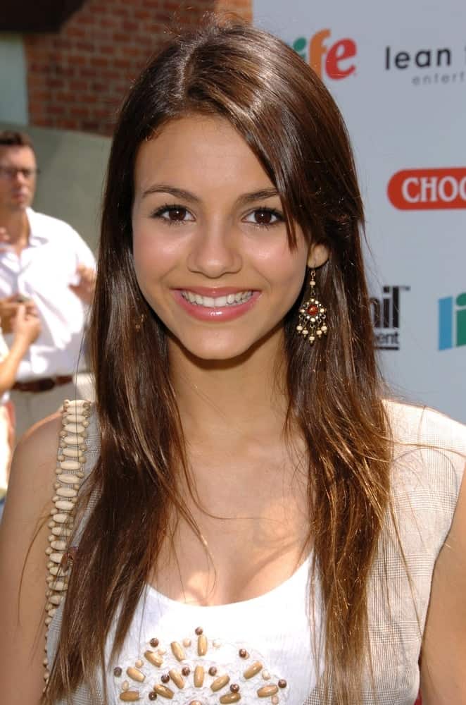Victoria Justice was at the "Choose Your Own Adventure: The Abominable Snowman" DVD Release Party at Star Eco Station on July 22, 2006 in Culver City, CA. She was lovely in her casual outfit and long, layered and tousled hairstyle that is loose with long side-swept bangs.