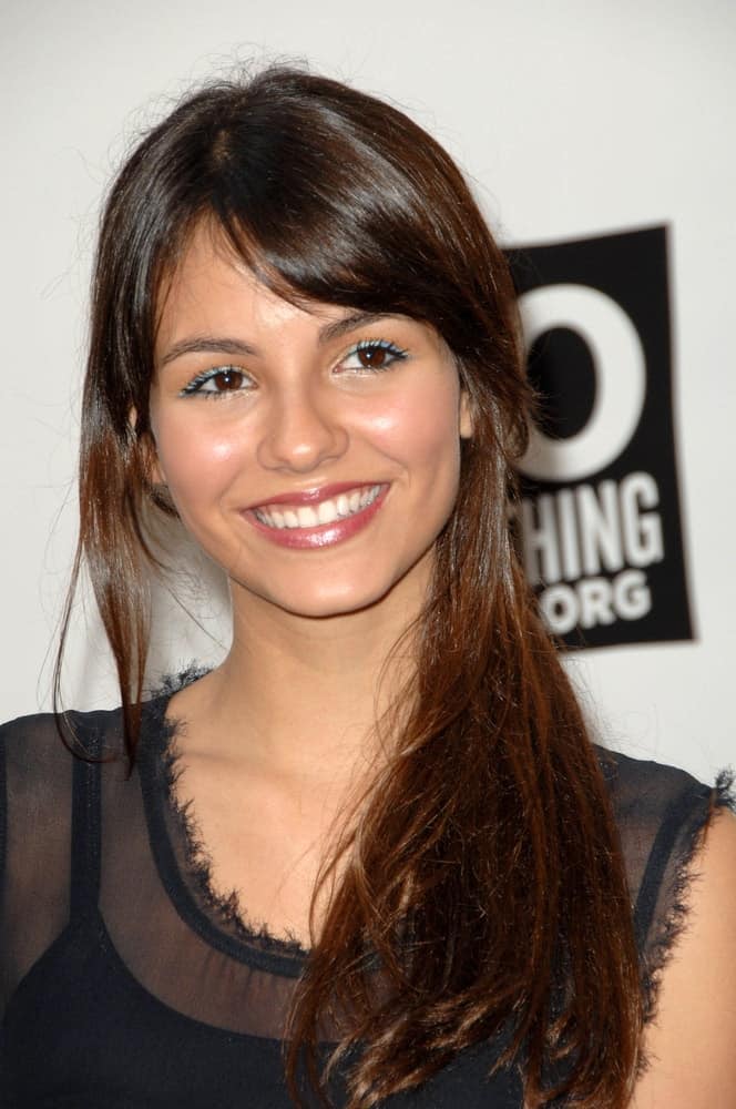 Victoria Justice was at the "The Do Something Awards" Pre Party for The 2008 Teen Choice Awards held at the Level3, Hollywood, CA on August 2, 2008. She wore a stunning black dress that went well with her side-swept hairstyle with long bangs and tendrils.
