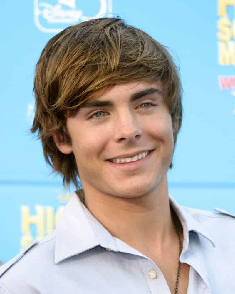 Zac Efron charmed his way through with tousled shaggy hair during the "High School Musical 2" premiere in California on Aug 14, 2007.
