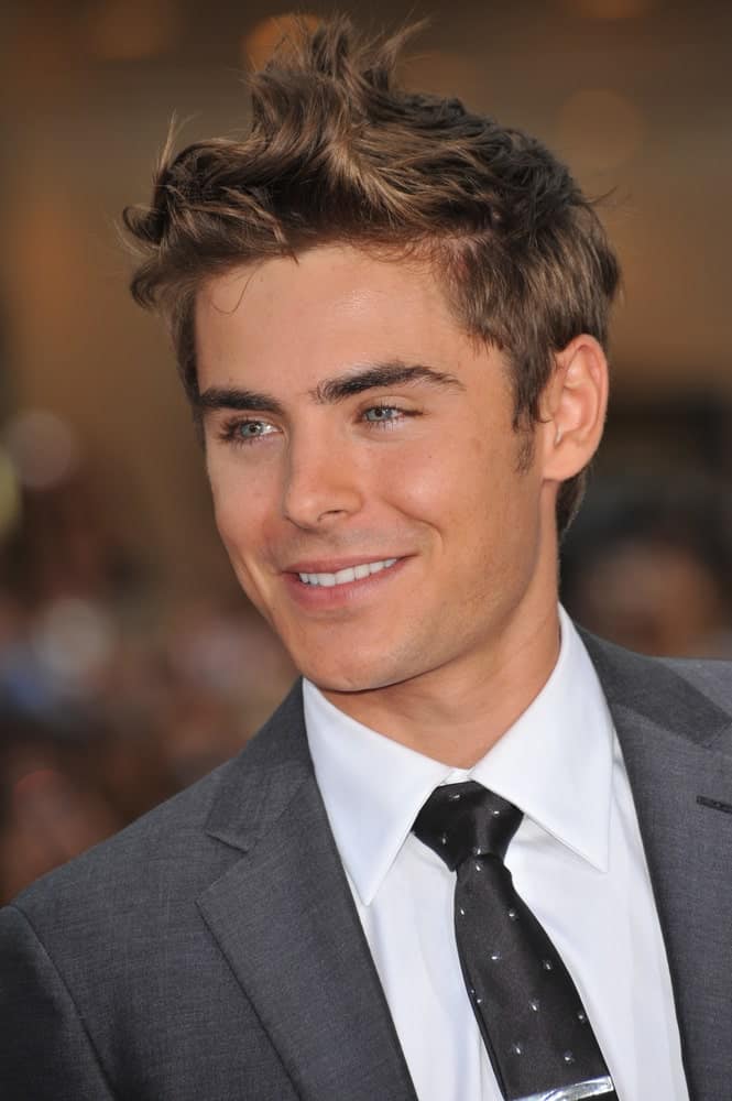 The actor exhibited his stylish wavy hairstyle with a messy touch at the world premiere of his new movie "Charlie St. Cloud" held on July 20, 2010.