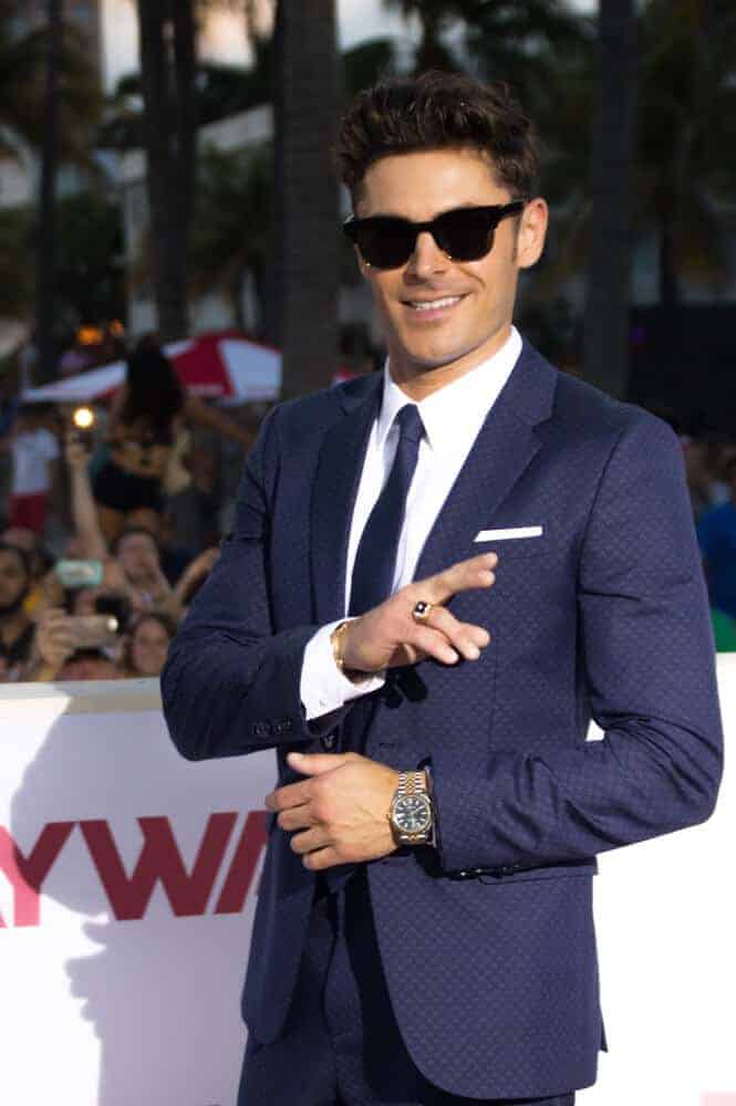 Zac Efron arrived at the premiere of Baywatch: The Movie in Miami Florida sporting a hairdo that resembles Elvis Presley's rockabilly look.
