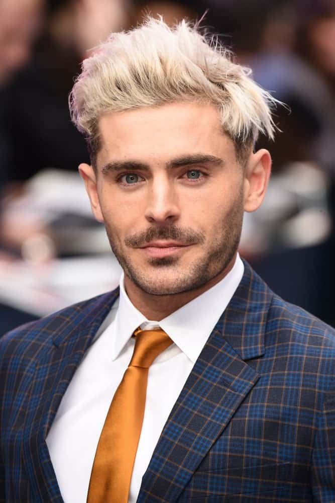 The actor styled his platinum blond hair with a pompadour undercut during the "Extremely Wicked, Shockingly Evil And Vile" premiere at the Curzon Mayfair, London on April 24, 2019.