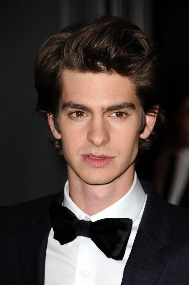 Andrew Garfield styled his brown hair with a sleek pompadour during the 2nd Annual Academy Governors Awards, Kodak Theater, Hollywood, CA in 2010.