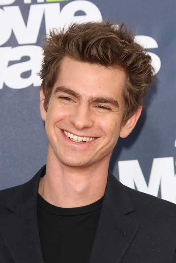Andrew Garfield sported a tousled look combined with spikes for the 2011 MTV Movie Awards Arrivals at Gibson Amphitheatre, Universal City, CA.