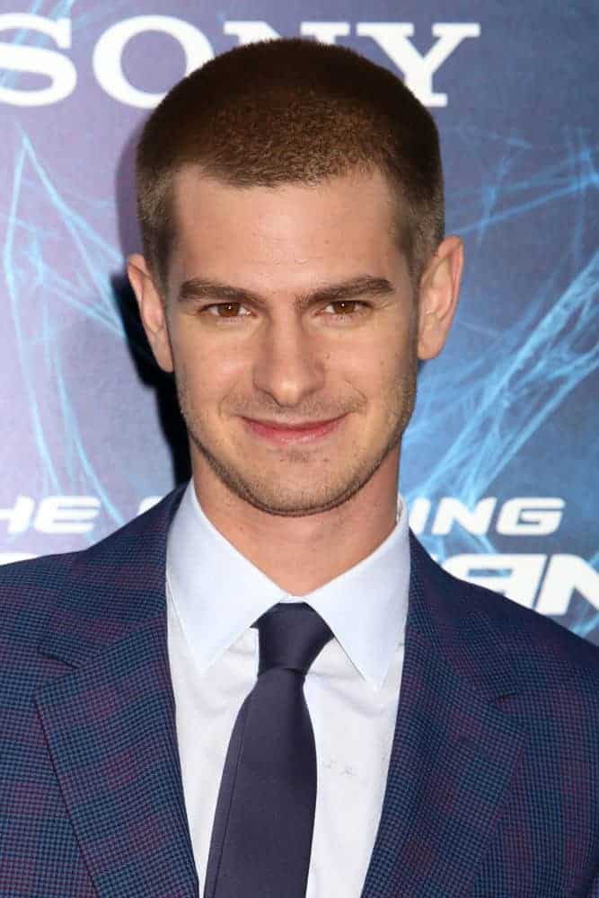 Andrew Garfield looked as sweet as ever even with a manly buzz cut during t...