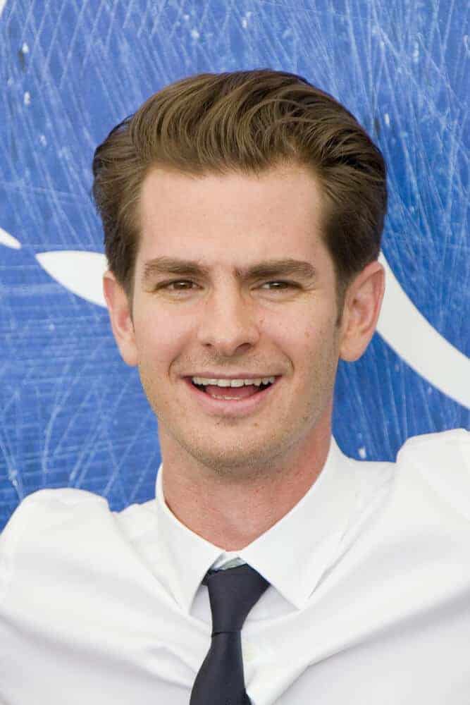 Andrew Garfield with his signature hairstyle while attending the photocall for 'Hacksaw Ridge' during the 73rd Venice Film Festival at Palazzo del Casino on in Venice, Italy.