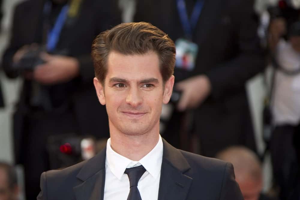 Andrew Garfield with a unique brushed up hairstyle while attending the premiere of his movie 'Hacksaw Ridge' during the 73rd Venice Film Festival on September 4, 2016.