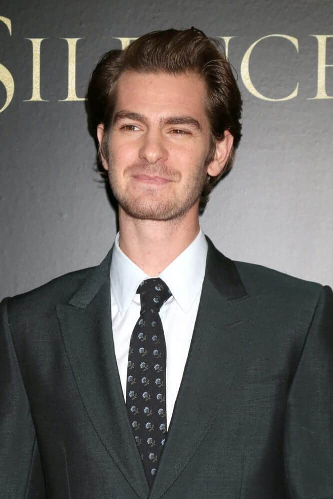 Andrew Garfield at the premiere of "Silence" in Directors Guild of America in Los Angeles, California on January 5, 2017 with his regular brushed up hairstyle.