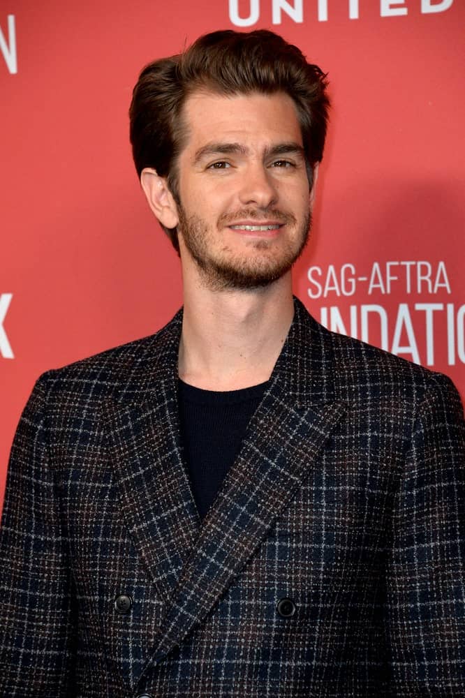 Andrew Garfield appeared at the SAG-AFTRA Foundation's Patron of the Artists Awards on November 9, 2017 with his usual brushed up hairstyle and a dark plaid suit.