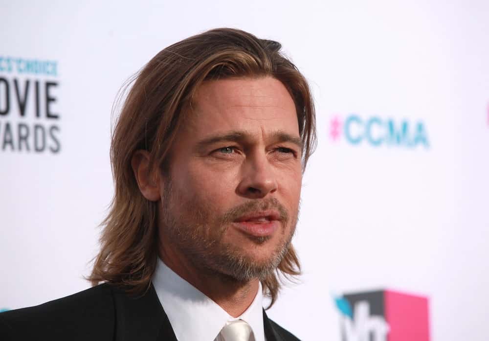 Brad Pitt attended the Critic's Choice Movie Awards back in January 12, 2012 in Hollywood, CA. He wore a classy suit and tie that perfectly complements his gorgeous highlighted long hairstyle and trimmed beard.