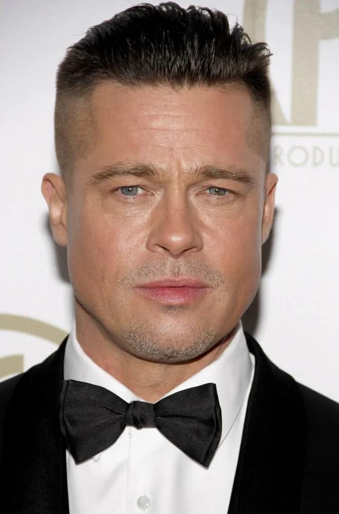Brad Pitt looked fierce with his slicked-back undercut hairstyle at the 25th Annual Producers Guild Awards held at the Beverly Hilton Hotel in Los Angeles on January 19, 2014 in Los Angeles, California.