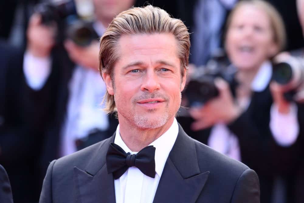 Last May 21, 2019, Brad Pitt attended the premiere of the film "Once Upon A Time In Hollywood" during the 72nd Cannes Film Festival. He wore a classy tuxedo with his slick brushed-up hair that has a slight pompadour look.
