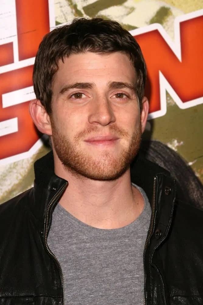 Bryan Greenberg sported a very short and slightly curly dark brown hairstyle for the Los Angeles Premiere of "Nobel Son" at The Egyptian Theater, Hollywood, CA back in 2008. It went quite well with his black leather jacket and brown eyes.