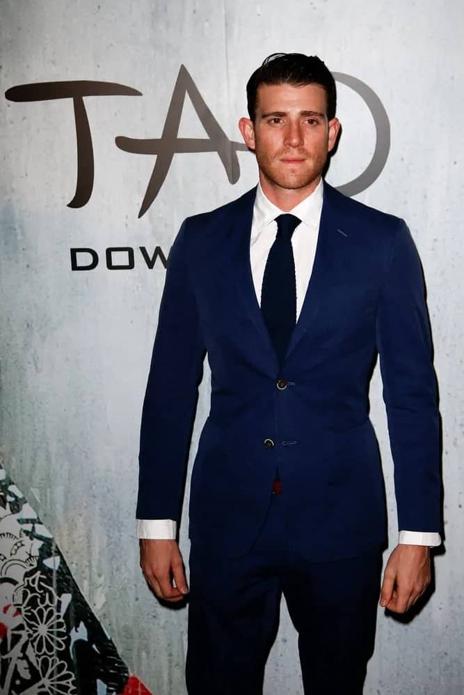 Bryan Greenberg was looking slick and sexy with his classy blue suit and brushed back pompadour hairstyle during the grand opening of TAO Downtown at the Maritime Hotel on September 28, 2013 in New York City.