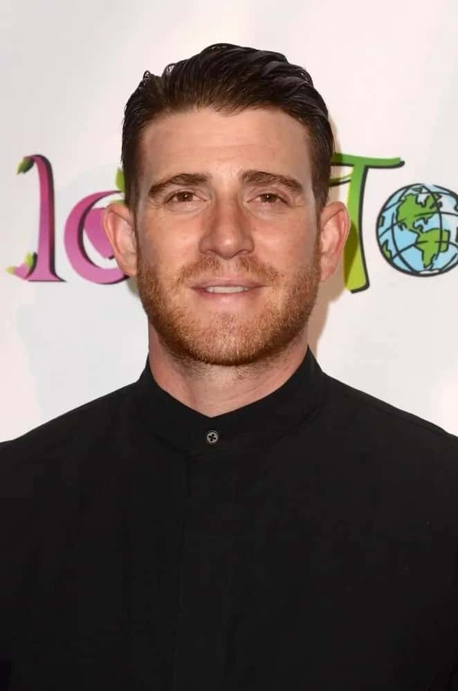 Bryan Greenberg wore a pure black outfit with his slick brushed back hair and trimmed beard at the "God VS Trump" premiere night at TCL Chinese 6 Theaters in Los Angeles, CA.