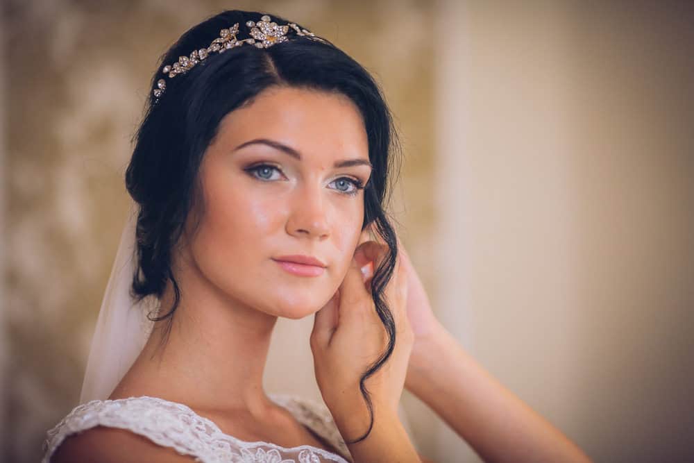 Side-part wedding hairstyle photo example.