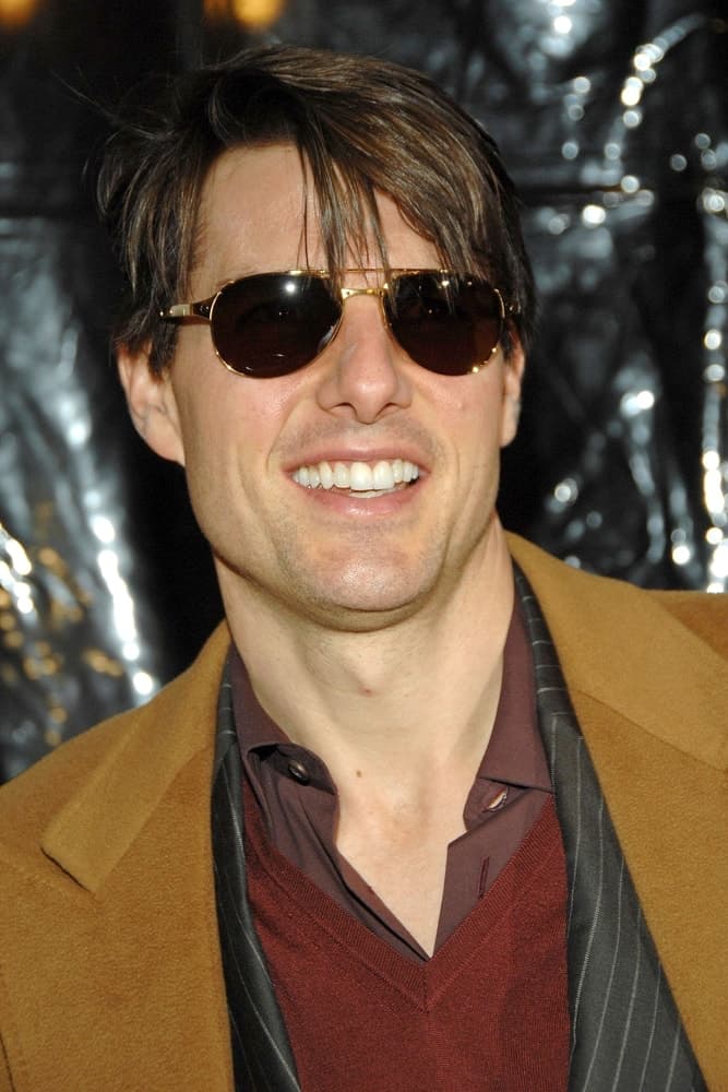Tom Cruise was at the I AM LEGEND Premiere at Madison Square Garden in New York back in December 11, 2007 wearing a tan suit to pair his highlighted and tousled side-swept hair.