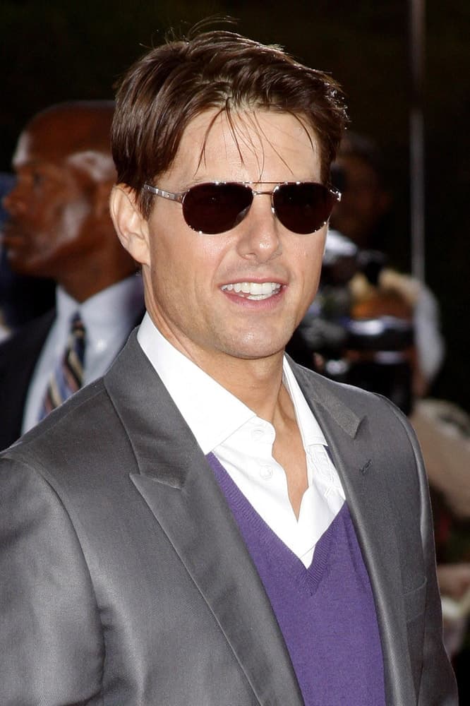 Tom Cruise opted for a slick side-parted hairstyle to pair with his gray suit at the Los Angeles premiere of 'Tropic Thunder' held at the Mann Village Theater in Westwood back in August 11, 2008.