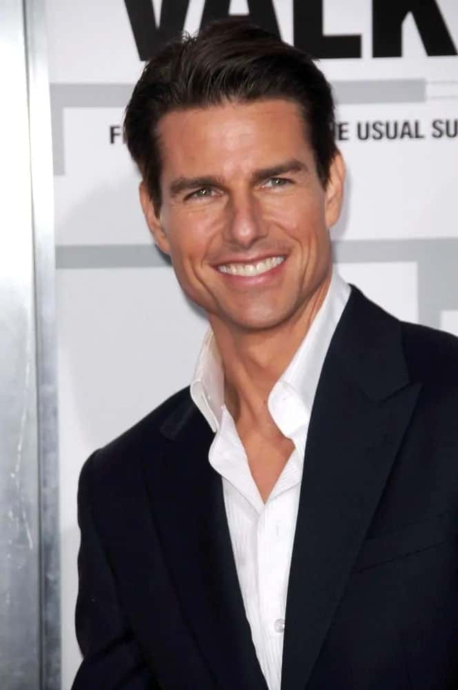 Tom Cruise had a slicked back hairstyle with a slight pompadour look that elevated the class factor of his suit and shirt outfit during the LA premiere of "Valkyrie" in 2008.
