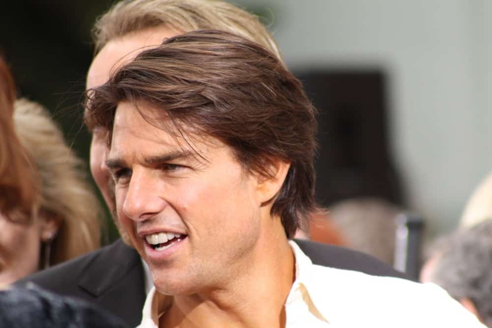Actor Tom Cruise was at the ceremony where Jerry Bruckheimer was immortalized putting his hand/footprints in cement in Grauman's Chinese Theatre last May 17, 2010. He wore a button-down shirt with his long highlighted hair.