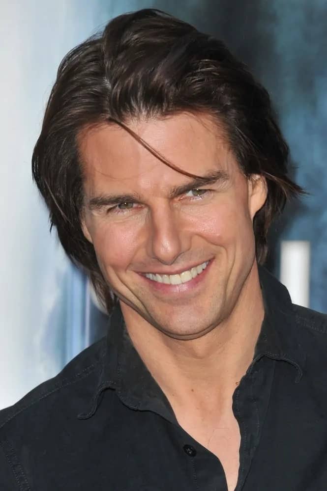 Tom Cruise pulled off a sexy long and center-parted hairstyle with bangs at the Los Angeles premiere of "Super 8" at the Regency Village Theatre in Westwood last June 8, 2011.
