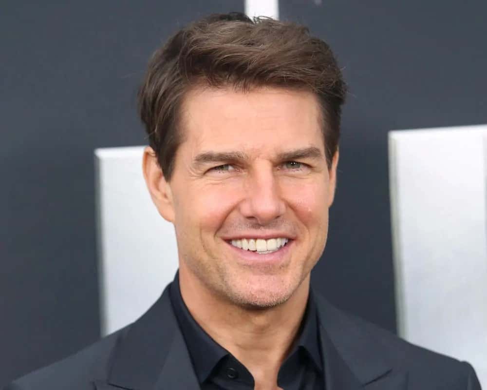 Tom Cruise sweeps his hair into a short side-parted straight casual hairstyle for the premiere of "The Mummy" at the AMC Lincoln Square Theater on June 6, 2017 in New York City.