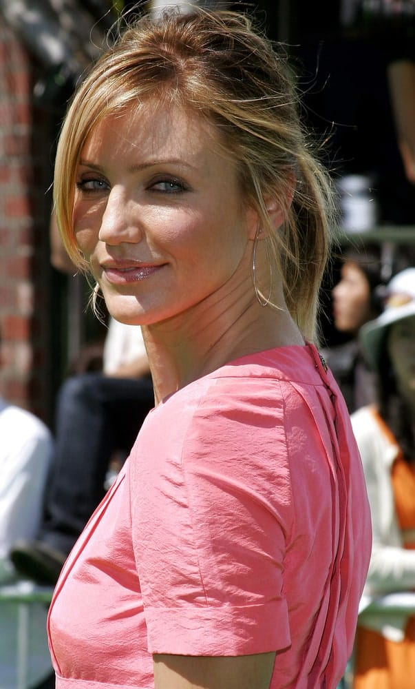 Cameron Diaz wore a casual messy ponytail to match her sweet pink dress at the Los Angeles premiere of 'Shrek 3' held at the Mann Village Theater in Westwood last May 6, 2007.