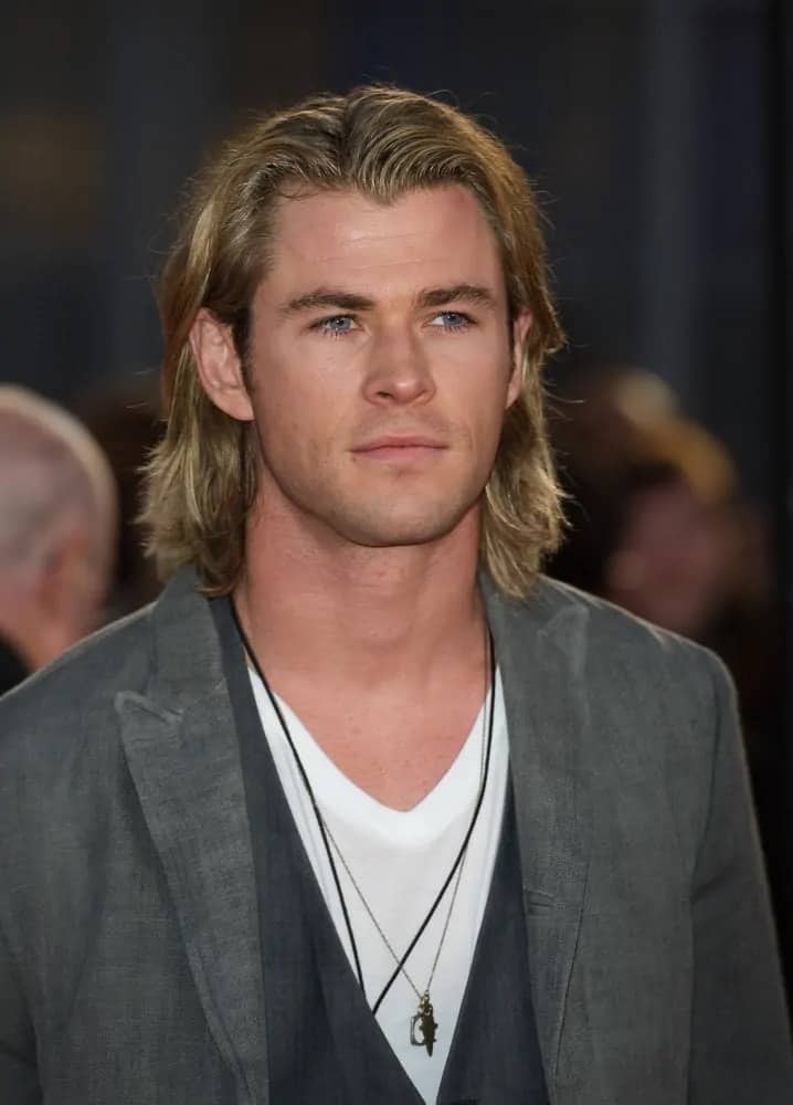 The actor had long dirty blond locks and a gray suit when he arrived at The Hunger Games Premiere in London last 2012.