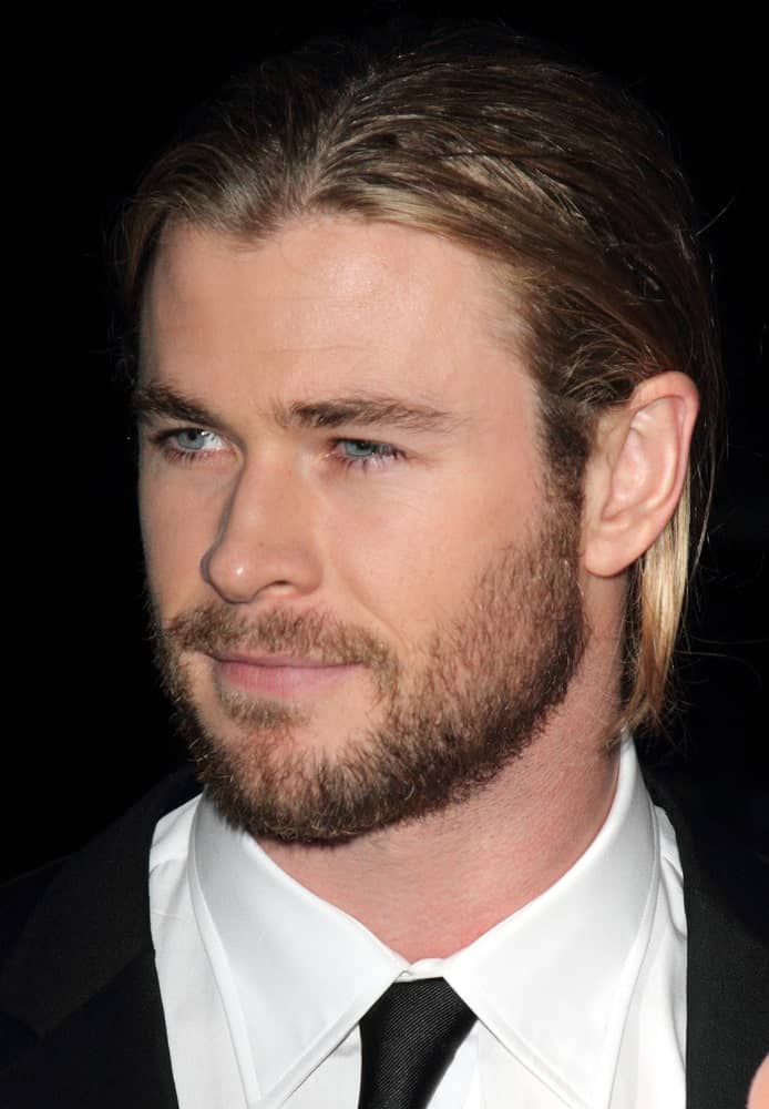 Chris Hemsworth was at the GQ Men of the Year Awards at the Royal Opera House, Covent Garden last September 4, 2012 with a classic black suit, slick back long hair and trimmed beard.
