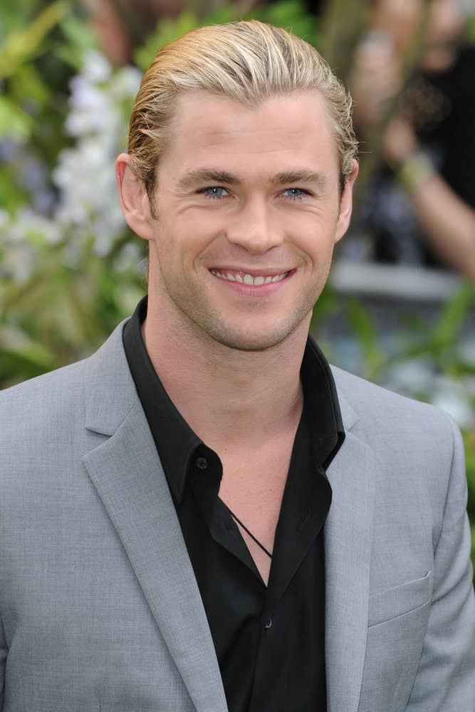Chris Hemsworth attended the premiere of "Snow White and the Huntsman" at the Empire, Leicester Square , London last May 14, 2012. Hemsworth wore a dapper gray and black ensemble with his long blond hair in a bun.