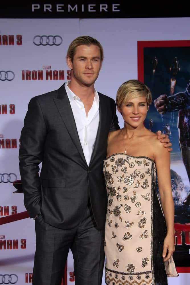 Chris Hemsworth was wearing a dark gray suit paired with his slicked back long hair. He was with Elsa Pataky at the "Iron Man 3" LA premiere at the El Capitan Theater last April 24, 2013 in Los Angeles.