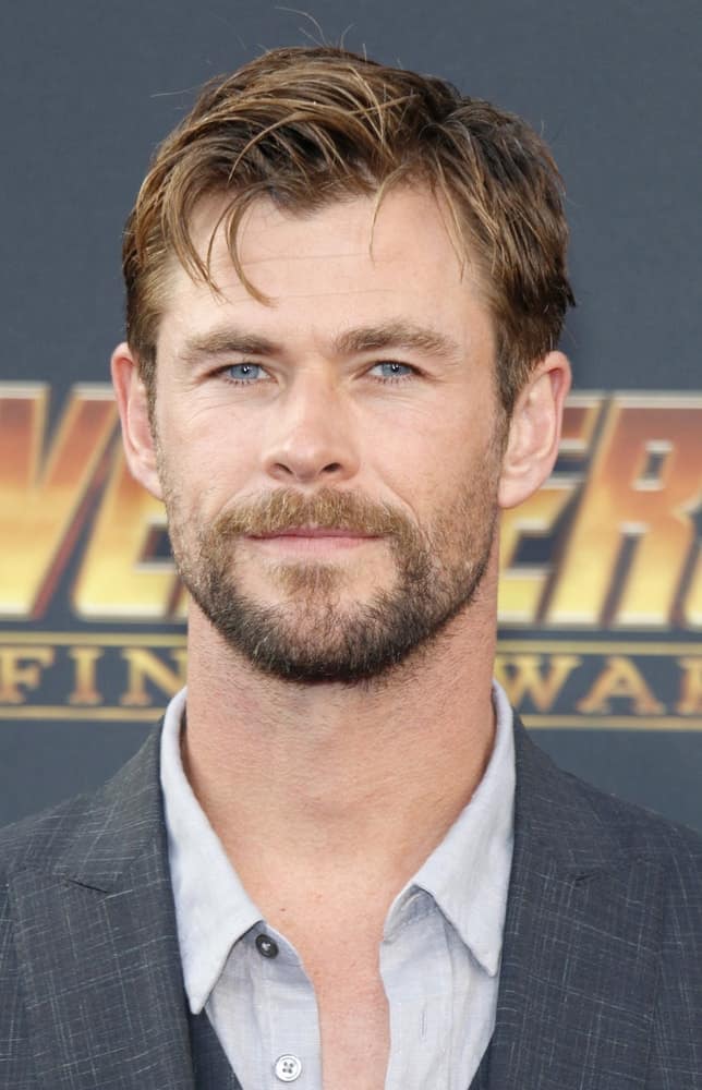 Chris Hemsworth attended the premiere of 'Avengers: Infinity War' held at the El Capitan Theatre in Hollywood, last April 23, 2018. His beard as well as his side-swept tousled hair were highlighted of the same caramel tone.