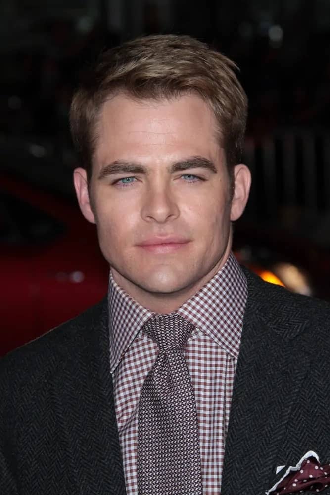 The ever classy Chris Pine sported a patterned shirt underneath his dark gray suit that went great with his short side swept fade crew cut hairstyle at the Los Angeles premiere of "This Means War" in 2012.