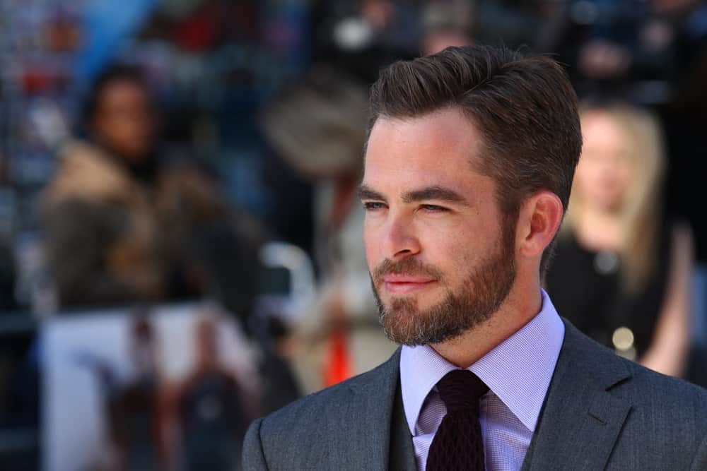 Chris Pine attended the UK Premiere of Star Trek Into Darkness at The Empire Cinema last May 2, 2013 in London. He wore a classy gray three-piece suit that paired well with his trimmed beard and side-swept pompadour hairstyle.
