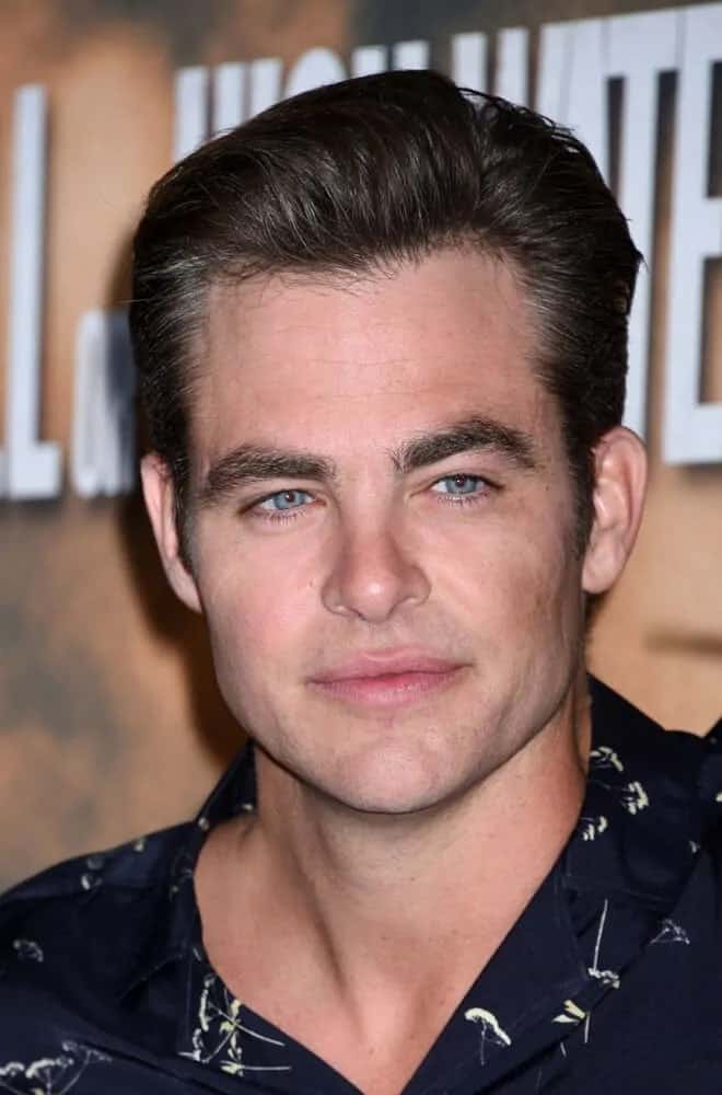 Chris Pine was at the "Hell or High Water" Los Angeles Special 2016 Screening with a clean-shaved face and a slick brushed-back hairstyle in downtown Hollywood, California.