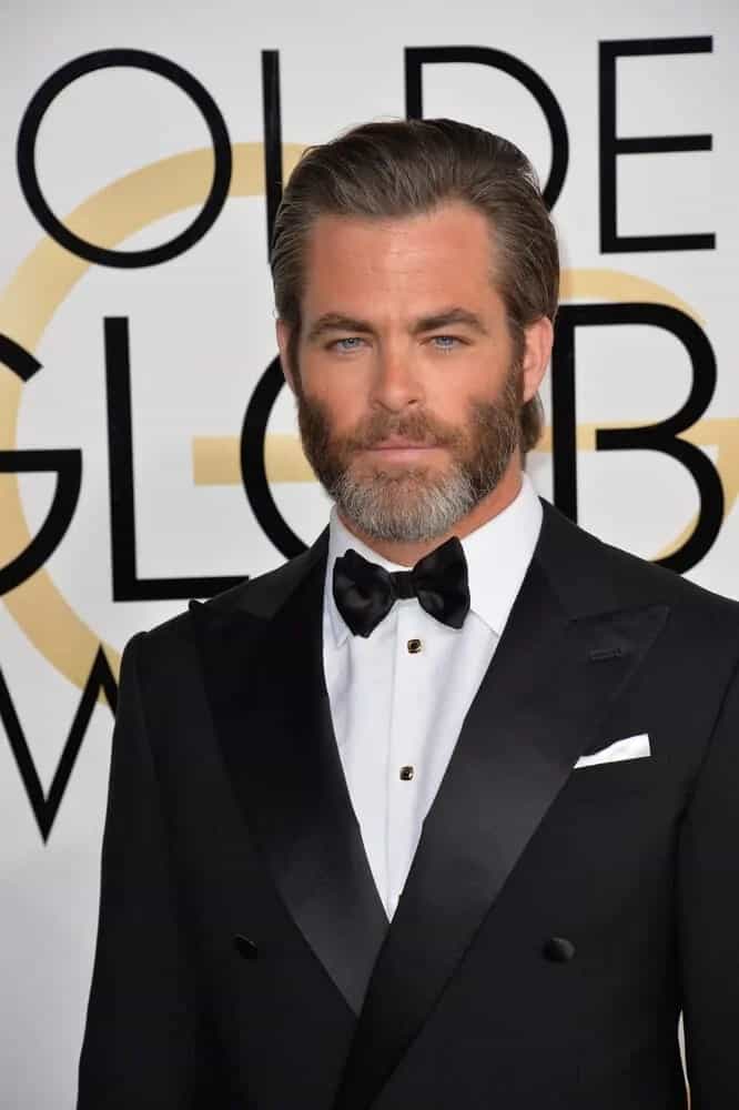 Chris Pine pulled off an elegant slicked back hairstyle with his full salt and pepper beard at the 74th Golden Globe 2017 Awards in The Beverly Hilton Hotel, Los Angeles.