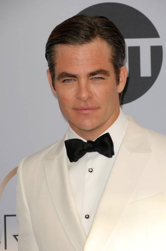 Chris Pine attended the 25th Annual Screen Actors Guild Awards at the Shrine Auditorium last January 27, 2019 in Los Angeles, CA wearing a classy white suit with his vintage dark slicked-back hair.