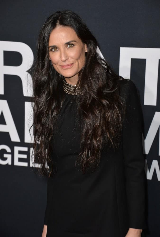 Last February 10, 2016, Demi Moore arrived at Saint Laurent at the Palladium fashion show at the Hollywood Palladium with a natural-looking permed hair and a classic black dress paired with a collared necklace.