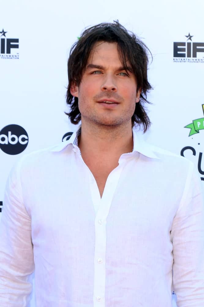 Ian Somerhalder rocked a messy hairstyle with his long locks at the EIF Presents: XQ Super School Live at the Barker Hanger on September 8, 2017. He complemented it with a white button-down polo for a fresh look.