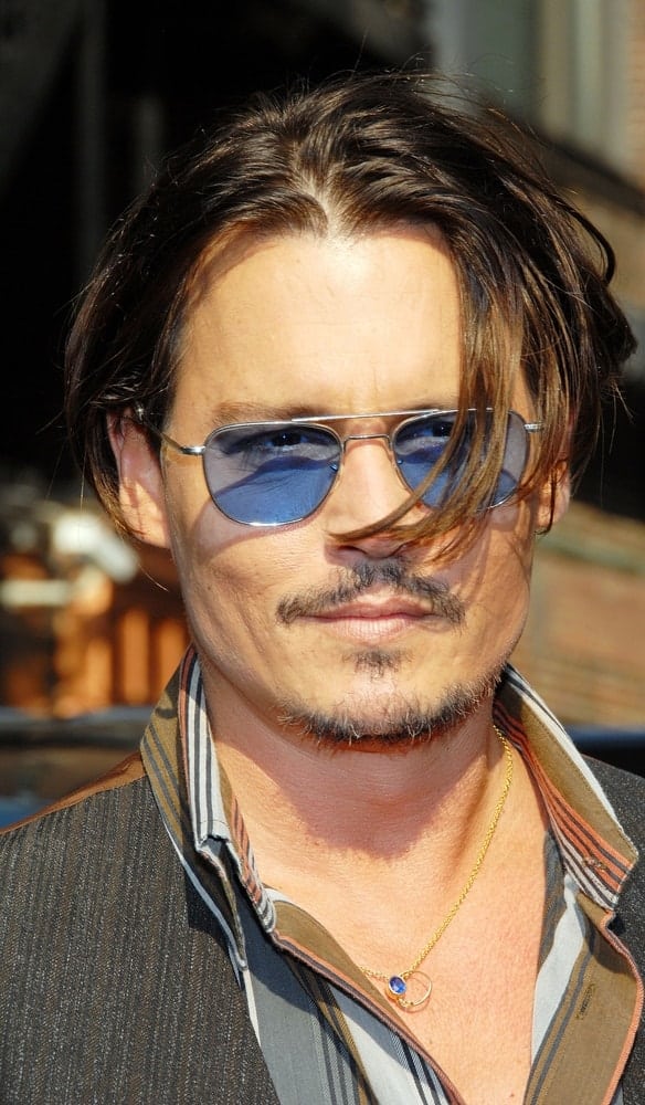 Johnny Depp was at The Late Show with David Letterman, Ed Sullivan Theater in New York last June 25, 2009. He went with his unique stylish fashion and long messy hair that has highlights at the tips.