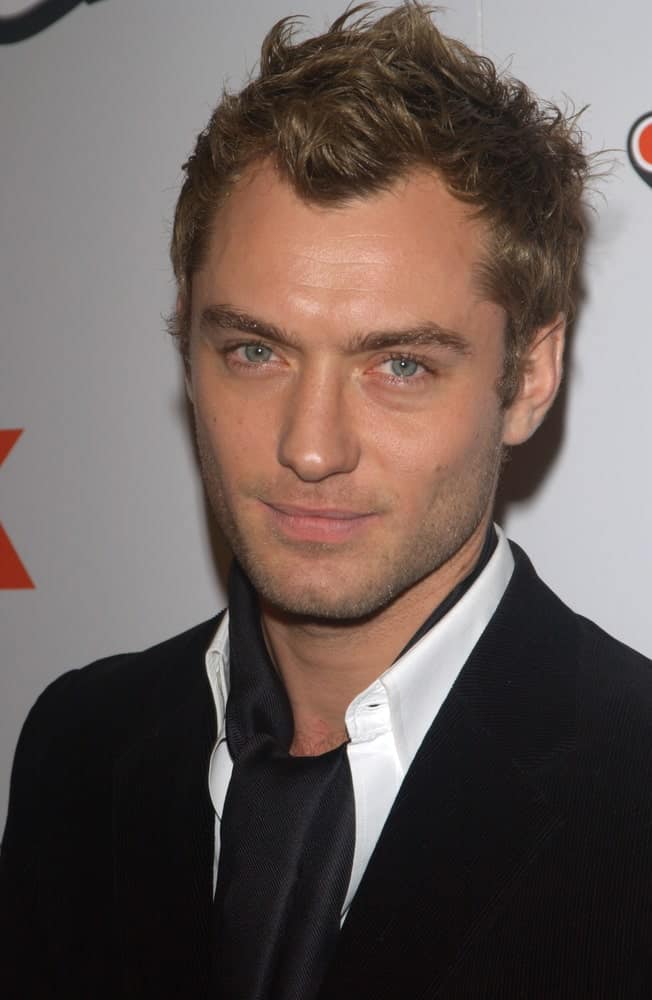 Actor Jude Law showcased his bright green eyes and short tousled brown hairstyle at the Los Angeles premiere of his new movie Cold Mountain last December 7, 2003.
