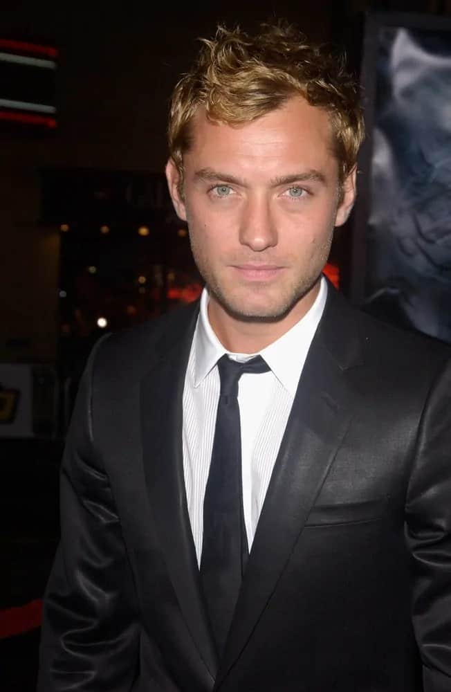 Jude Law looked dashing with hi golden curls tossed up when he attended the 2004 world premiere of his movie "Sky Captain and the World of Tomorrow" at Grauman's Chinese Theatre in Hollywood.
